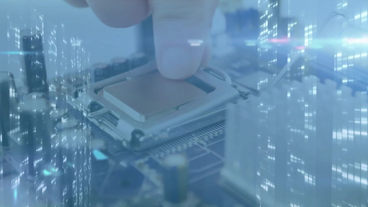 Close-up of technician fixing a chip on a motherboard