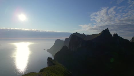 aerial forwarding shot of scenic mountain landscape from the adventurous fairytale island senja in northern norway