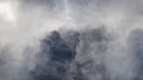 point of view enters a dark cloud with a thunderstorm that strikes