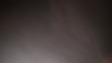 ambient smoke and fog in front of dark backdrop for halloween or sci-fi background