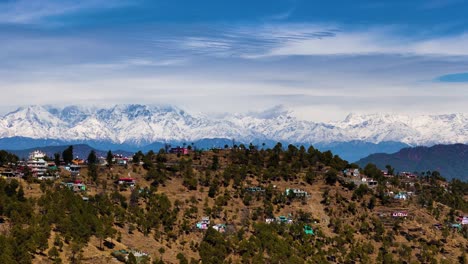 snow-capped mountains and village landscape