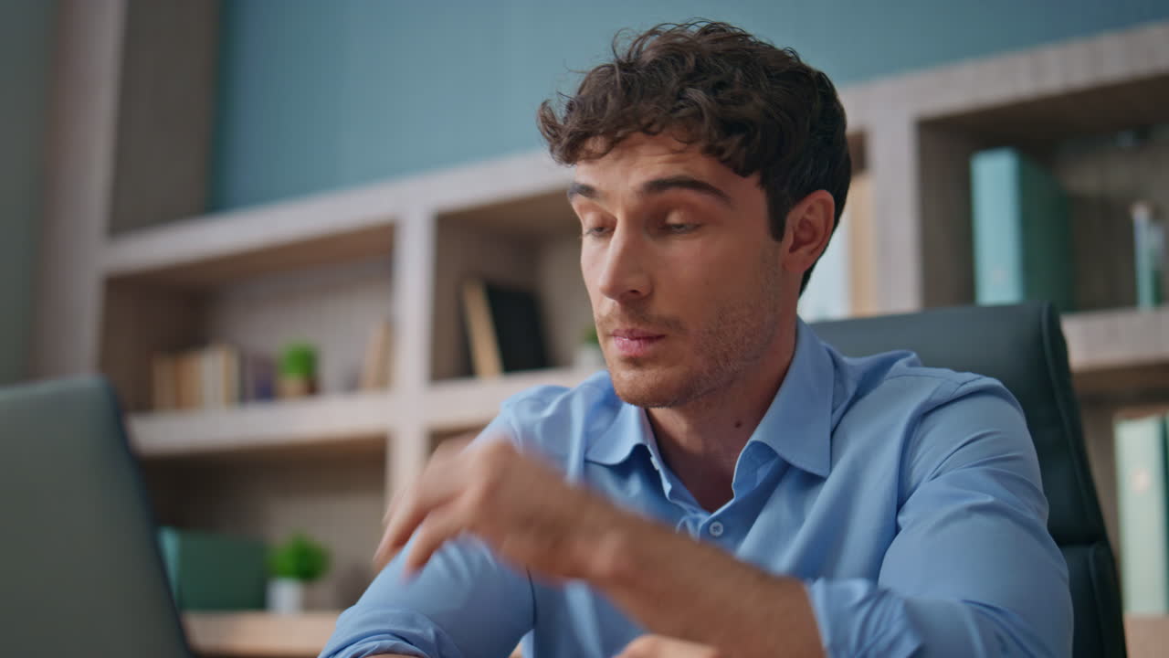 Office man rubbing eyes after working day closeup. Exhausted manager look laptop