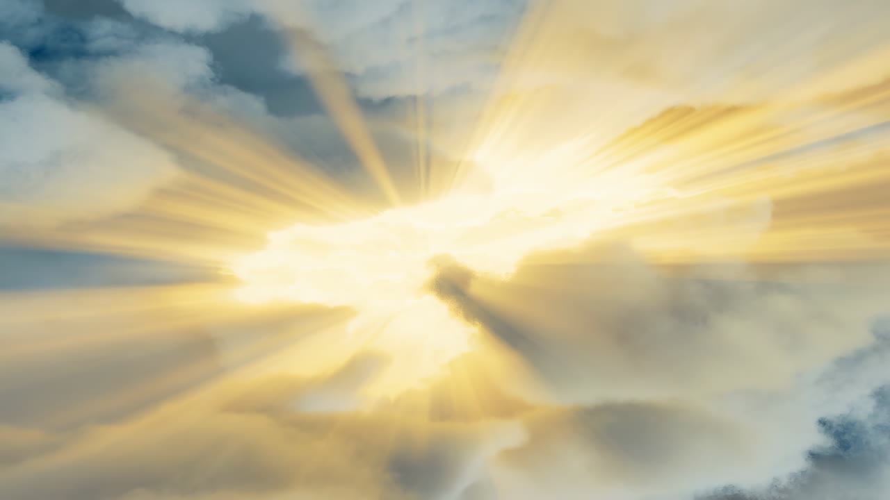 Golden Sunbeams Breaking Through Ethereal Clouds