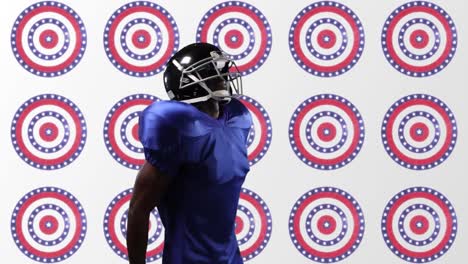 jugador de rugby afroamericano que usa un casco contra las estrellas en múltiples círculos giratorios