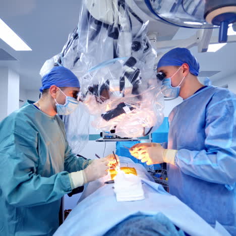 surgery team operating in a surgical room. closeupof the process. health treatment concept.