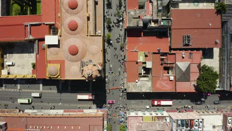 Bird's-Eye-Aerial-View-of-People-in-Urban-Neighborhood-at-a-Market,-CDMX-Mexico