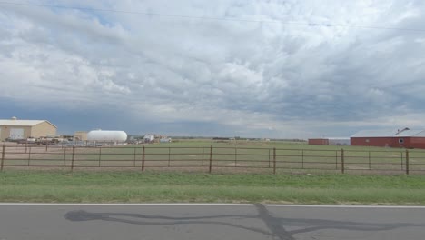 modern farm houses and barns in this roadside america drive by