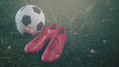 animation of light spots over sports shoes and football