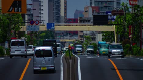 a timelapse of the traffic jam at the urban street in tokyo long shot