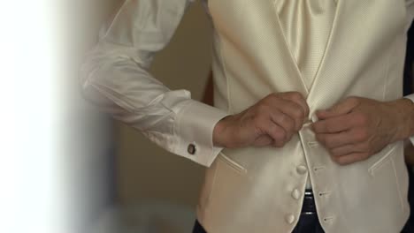 groom getting ready in slow motion