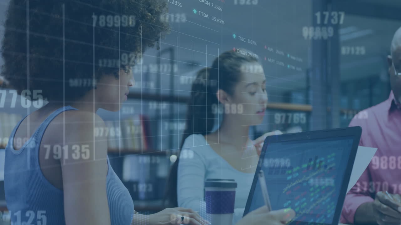 Animation of financial data processing over diverse business people in office