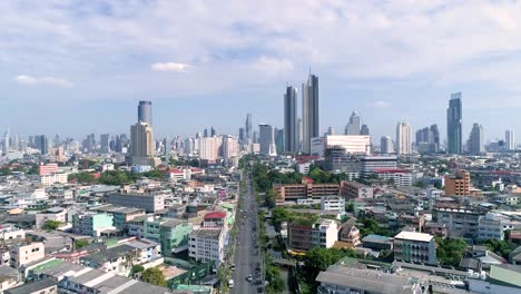 aerial, driving out of a big city