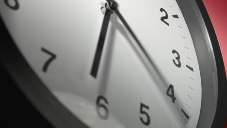 clock face on burgundy cherry red wall in time lapse