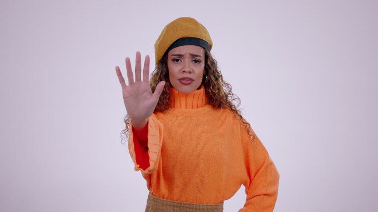 Face, hand or woman with stop