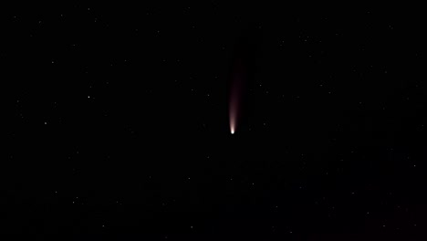 beautiful shooting star in the evening sky, panning left