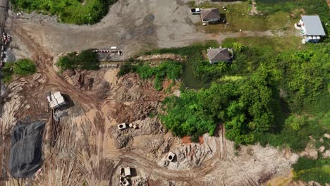 aerial view of active construction site with roadwork and utilities