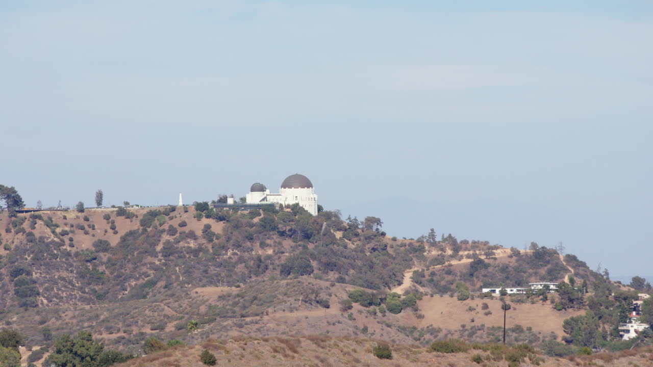 Long lens view of Griffith Observatory and hills | Premium Stock Video ...