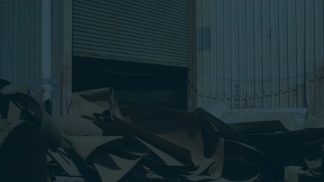 animation of financial data and graphs over junkyard
