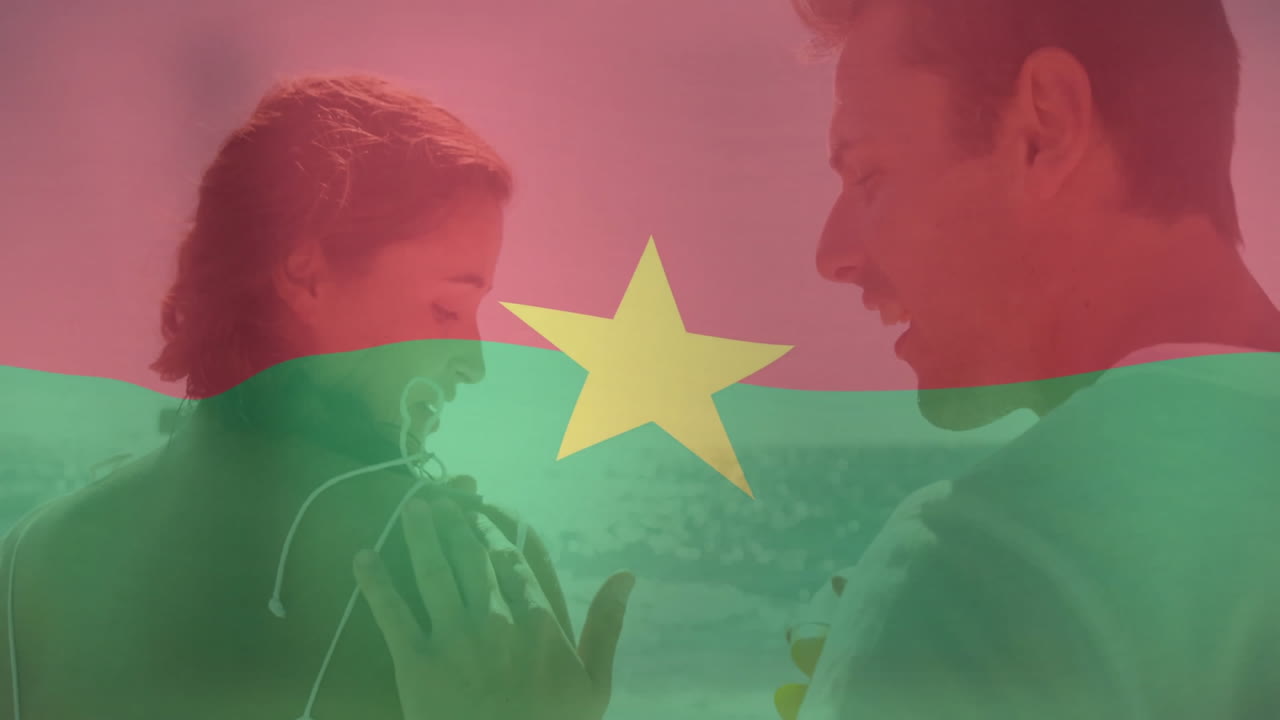 Listening to music, couple with Burkina Faso flag animation overlay