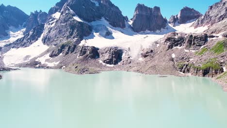 Lake-with-a-reflection-of-Mountain-cliffs-in-the-water---Chitta-katha-lake-Neelum-Valley-Kashmir,-Himalayan-mountain-range