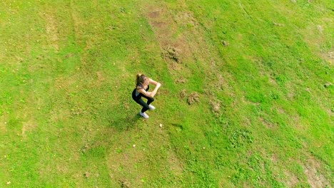 4k shot of young beautiful women doing exercises outdoor in a park at sunrise