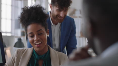 mixed-race-business-woman-chatting-with-colleagues-in-office-meeting-having-conversation-sharing-ideas-in-corporate-workplace