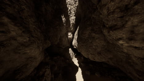 a narrow passage between two large rocks