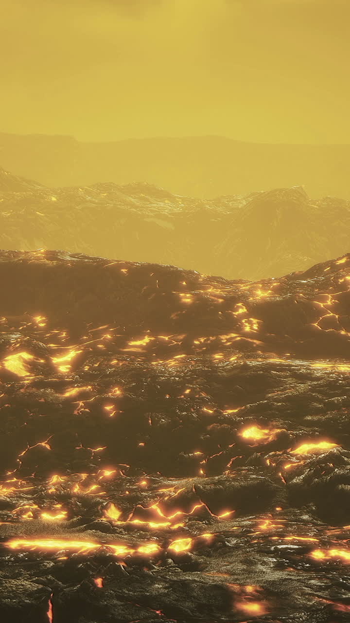 Lava flows illuminate the rugged landscape under a golden sky at dusk