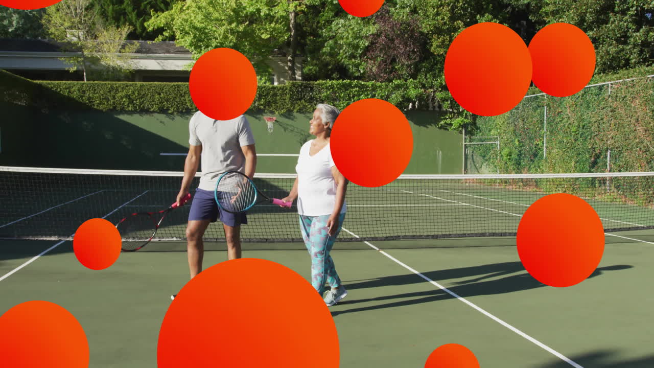 Man and woman holding rackets on court, presenting animated sports performance data overlay