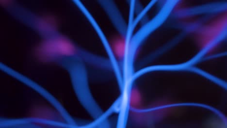 closer look of the purple rays inside the plasma ball