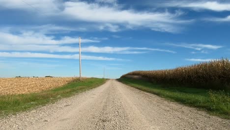 point of view footage while driving down a gravel road in rural iowa