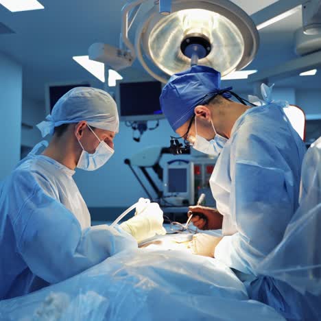 surgeons working on patient in operating room. modern equipment in operating room