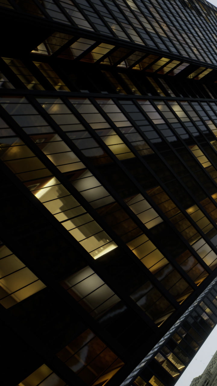 Urban reflections create a dance of light and shadow in the cityscape