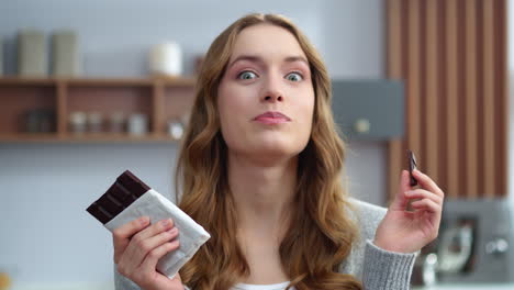 relaxed woman enjoying chocolate