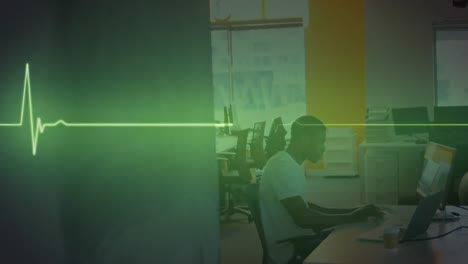 Animation-of-glowing-light-over-african-american-businessman-in-office