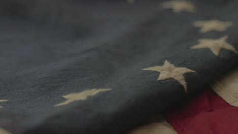 detail of american flag with 13 stars of the revolution