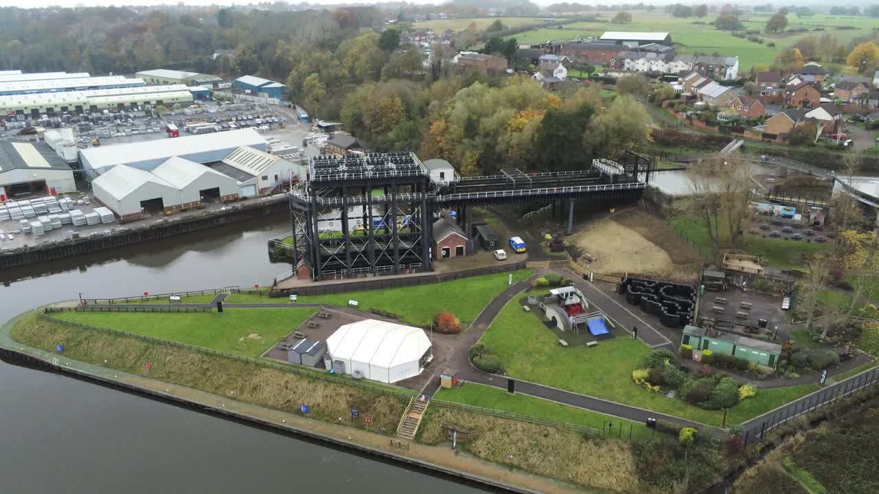 Industrial Victorian Anderton canal boat lift Aerial view River Weaver high descending shot