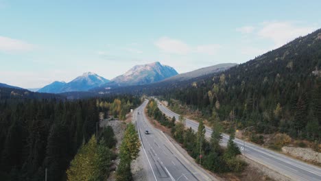 Majestic-View-of-Vehicles-driving-on-the-Coquihalla-Highway-5-in-British-Columbia-Canada-on-a-sunny-day-in-the-fall