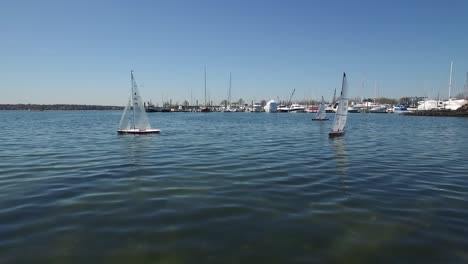 An-aerial-over-toy-boats-racing-on-a-lake-3