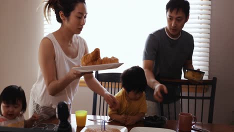 family enjoying time relaxing together at home