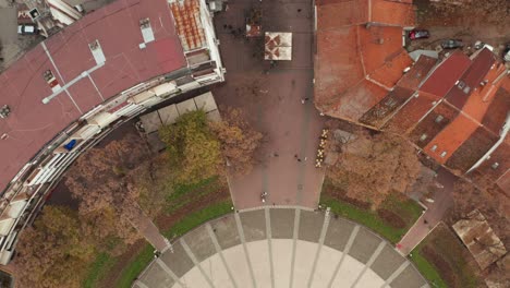 People-Walking-At-The-Central-Square-In-Kraljevo,-Serbia