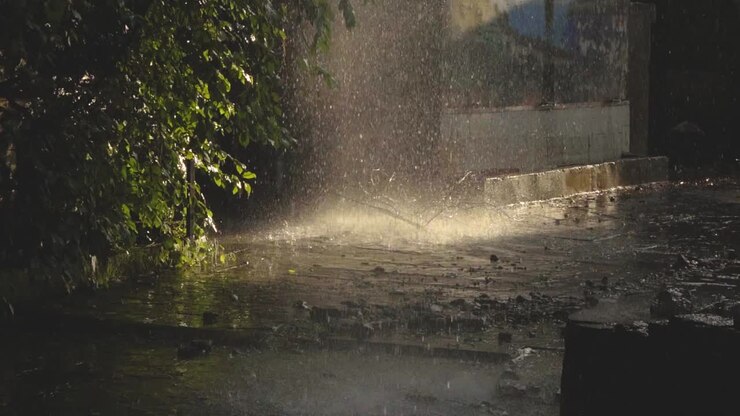 Slowmotion shot of a Waterfall flowing at a temple of Shivpuri Madhya Pradesh , India