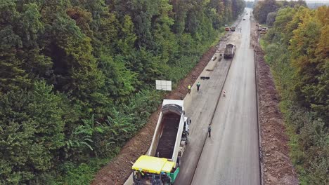 aerial view. laying a new asphalt on the road. construction of the road