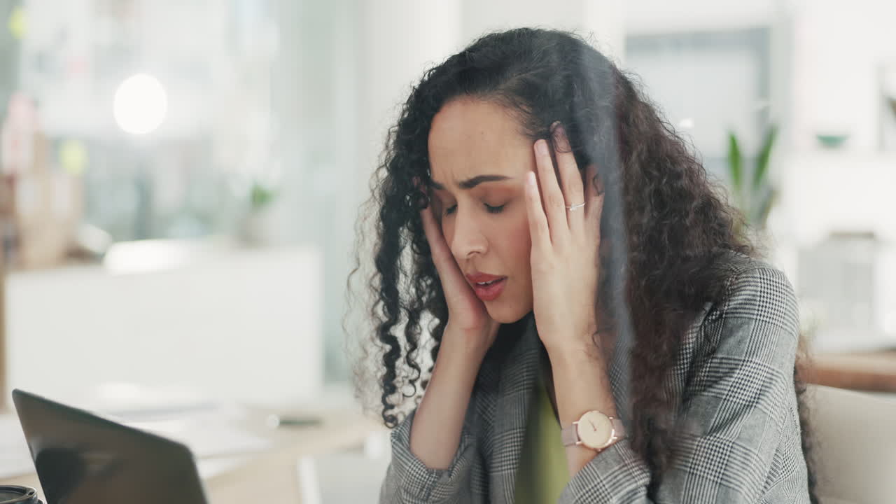 Worry, stress and business woman on laptop