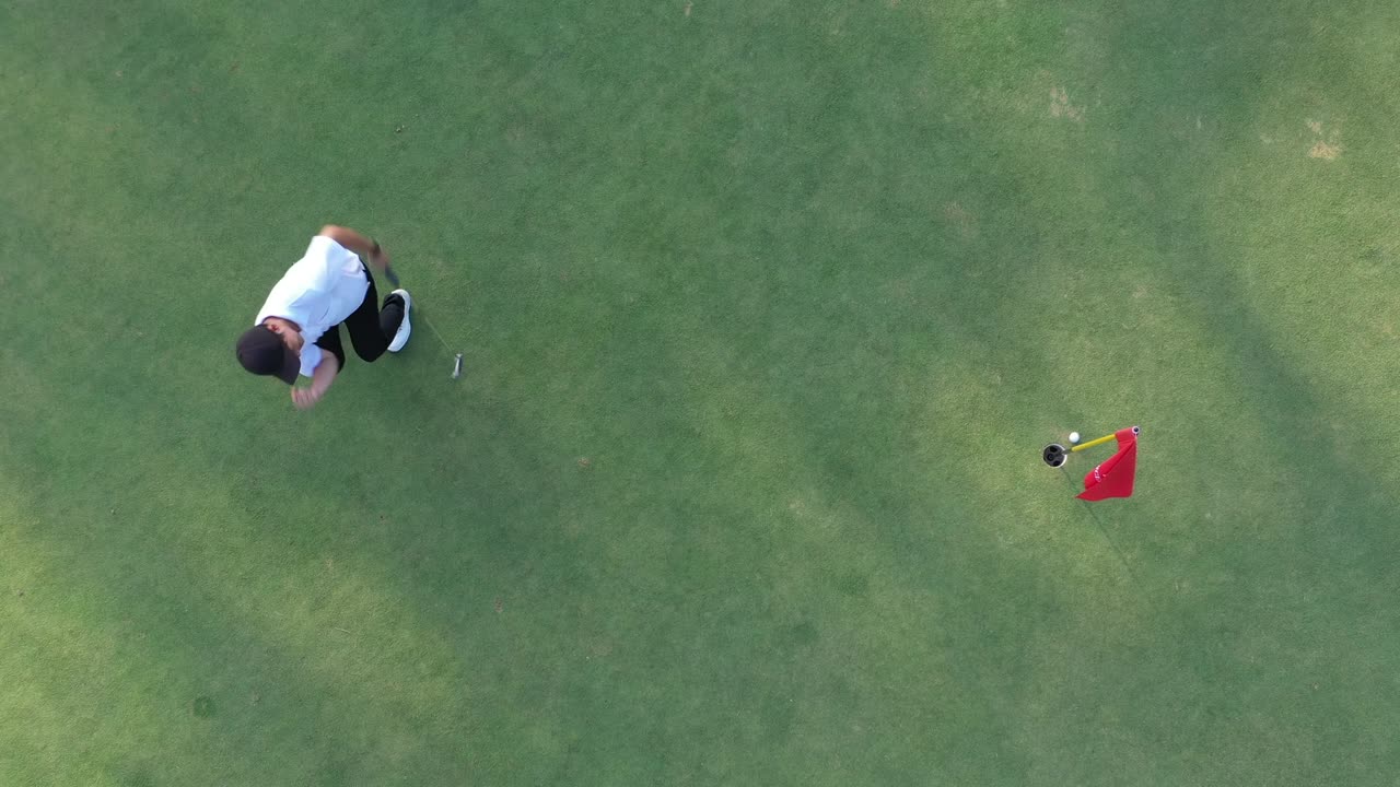 Top view of asian male golf player failed strike on the golf course. Fail, failure, bad day concept.