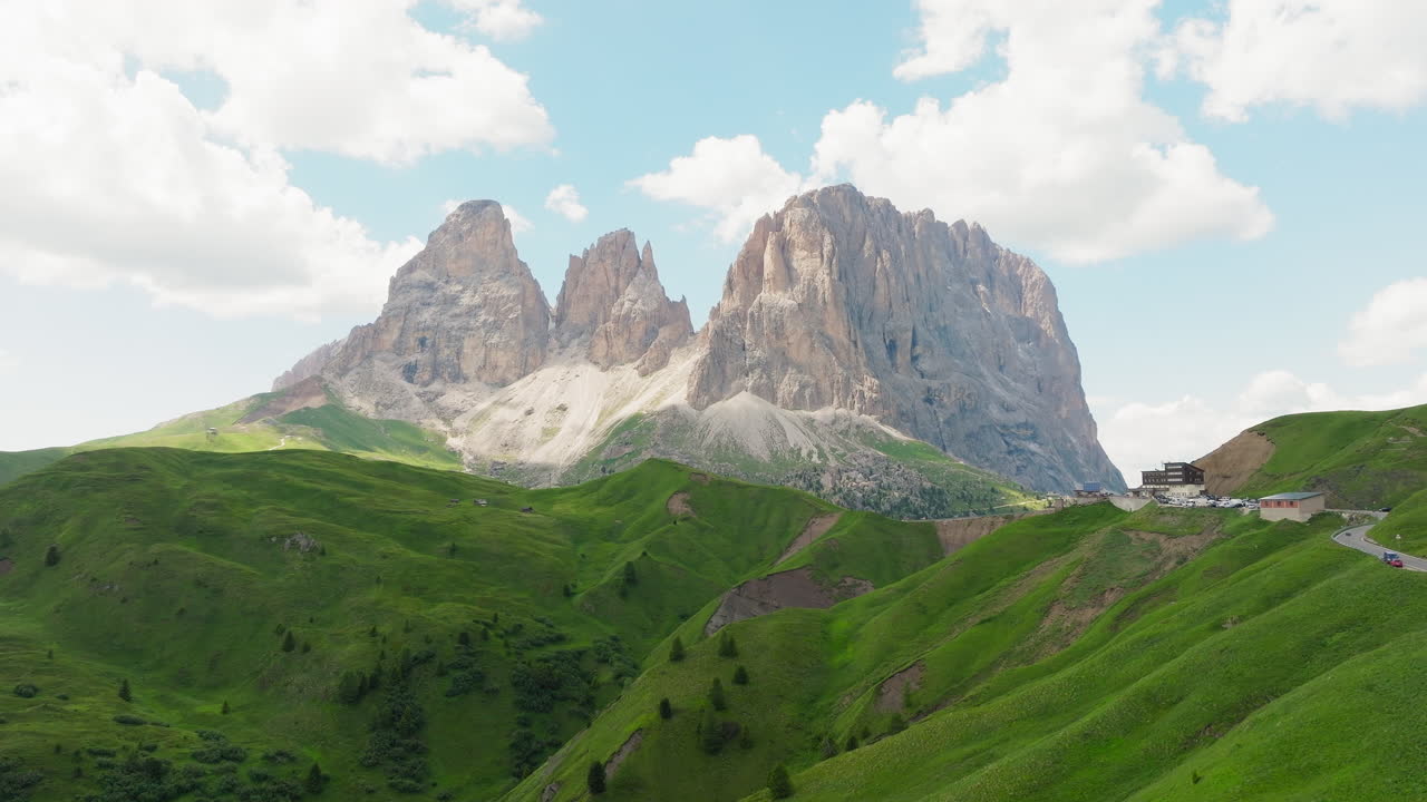 Panoramic drone shot of Sassolungo mountain in Dolomites, Italy