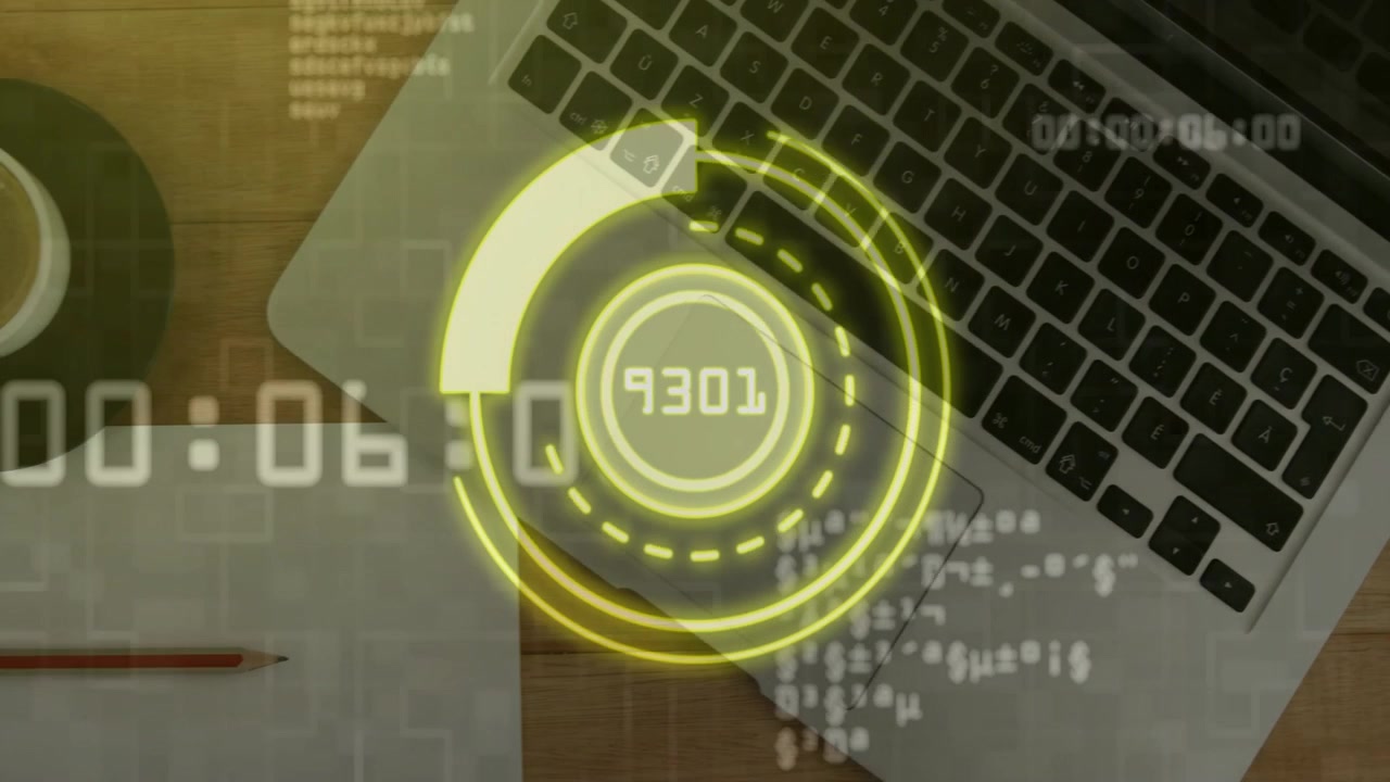 Countdown starting, translucent yellow HUD rotating and pulsing over silver laptop, showing status