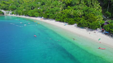 Aerial-Drone-Shot-Of-Tropical-Beach-Scene-With-Turquoise-Blue-Water-In-Canibad-Beach-In-Samal-Island-Davao-Mindanao-Philippines