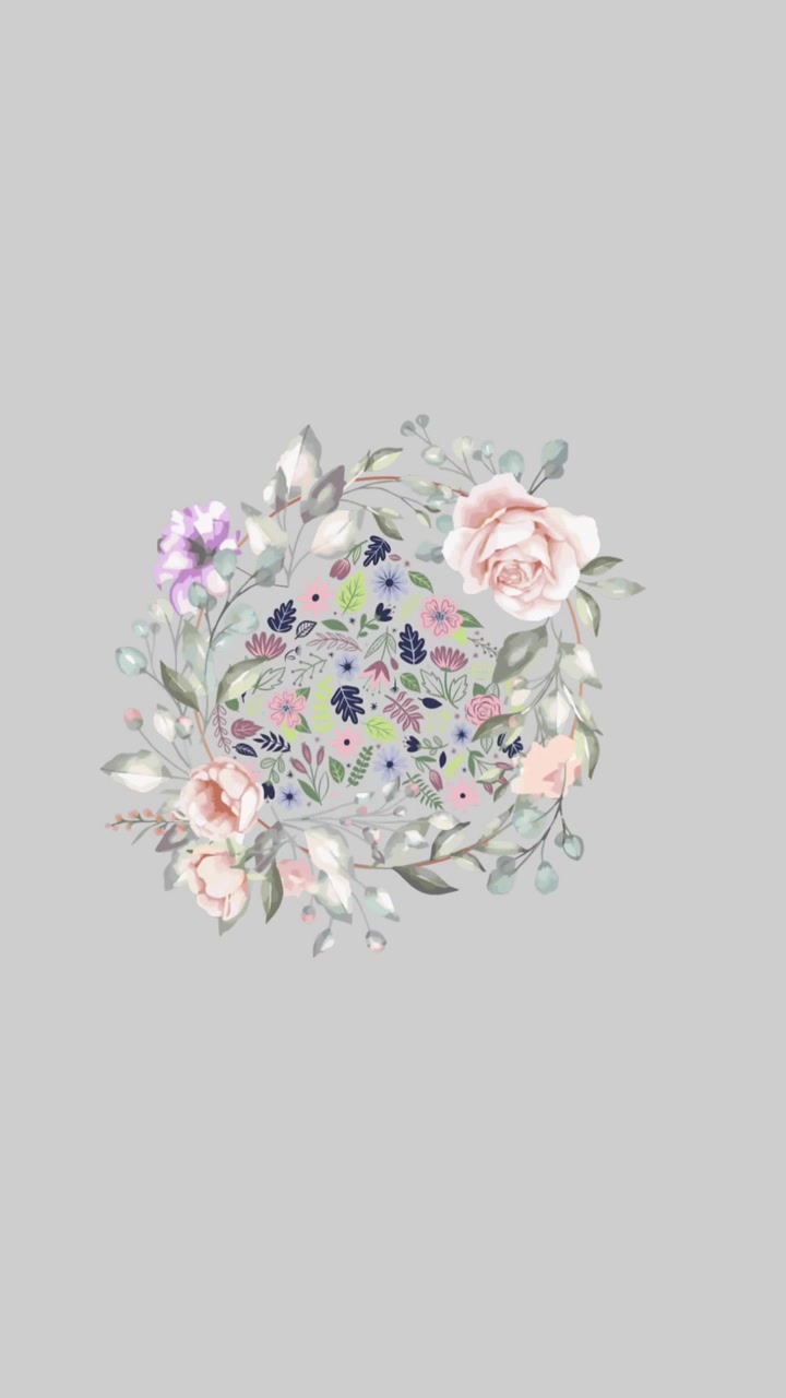 Animazione di fiori e cuore che ruotano in movimento ipnotico su sfondo grigio.