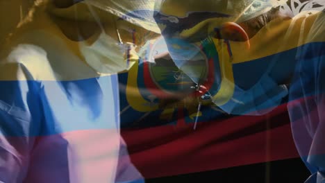 Animation-of-flag-of-ecuador-waving-over-surgeons-in-operating-theatre